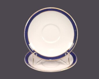 Pair of Alfred Meakin Blue de Roi orphaned saucers only made in England.