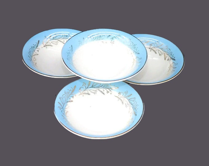 Four Washington Pottery Blue Riband coupe cereal bowls made in England.