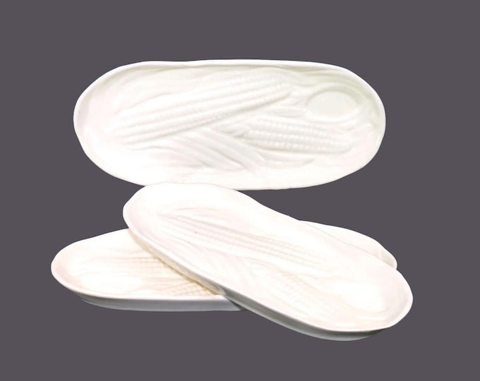 Three all-white embossed corn-on-the-cob oval plates made in Czechoslovakia.