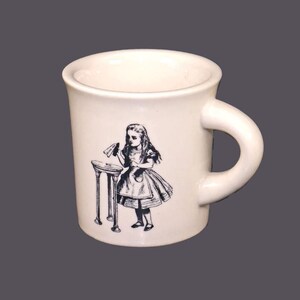 Vintage Fishs Eddy ceramic Alice in Wonderland series Drink Me coffee or tea mug.