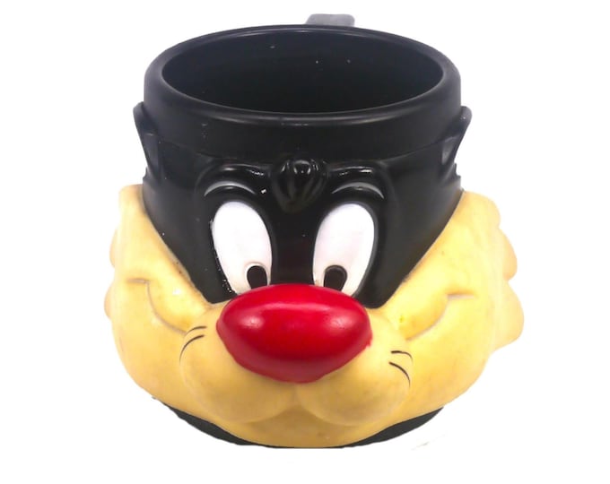 Vintage Warner Brothers Sylvester the Cat plastic character mug.