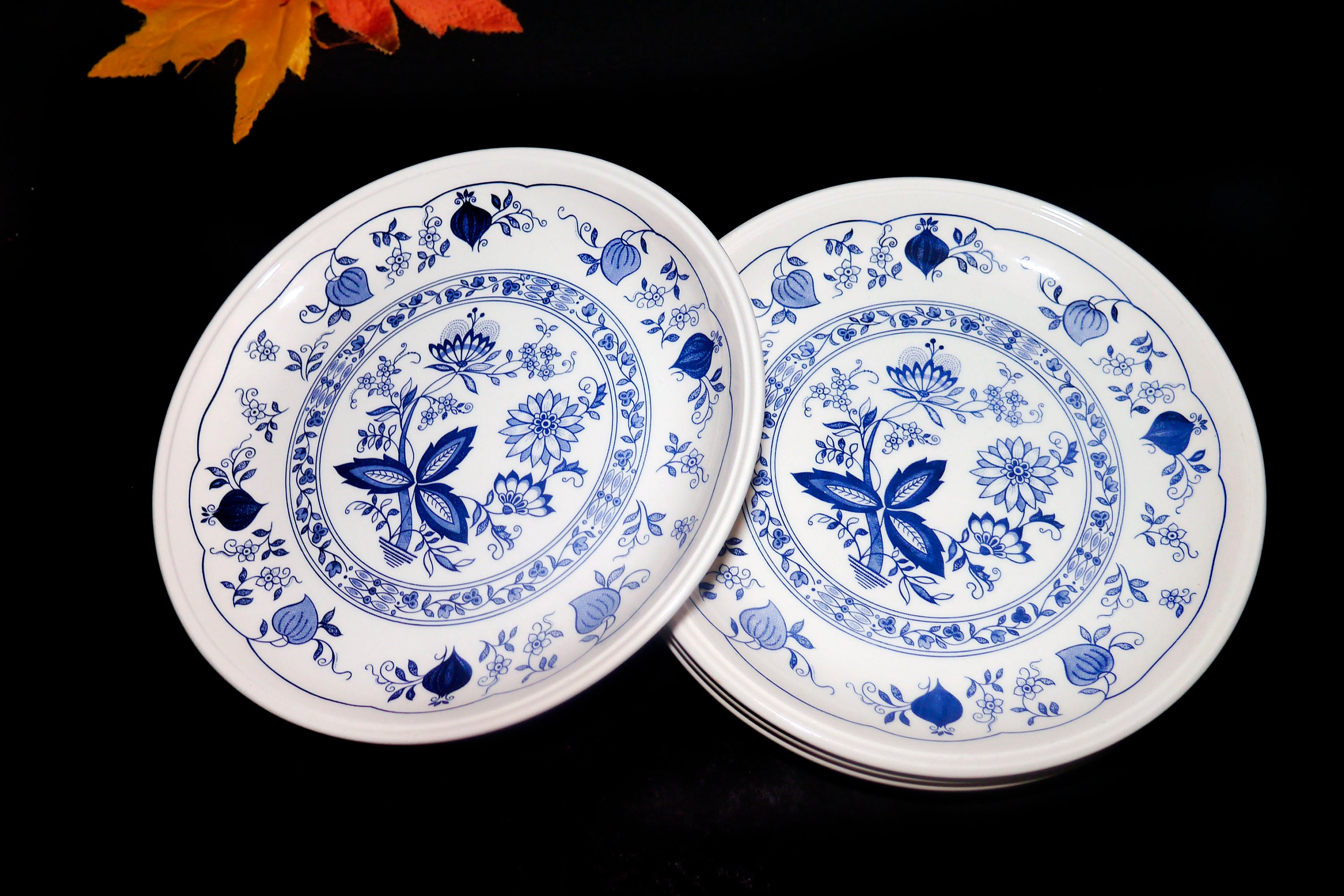 Four Biltons Blue Onion dinner plates made in England.