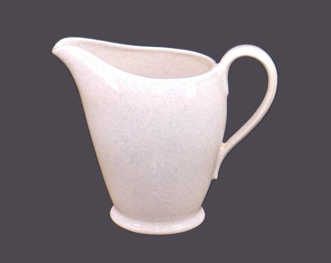 Grindley GRI490 16-ounce milk jug made in England. White with blue speckles.