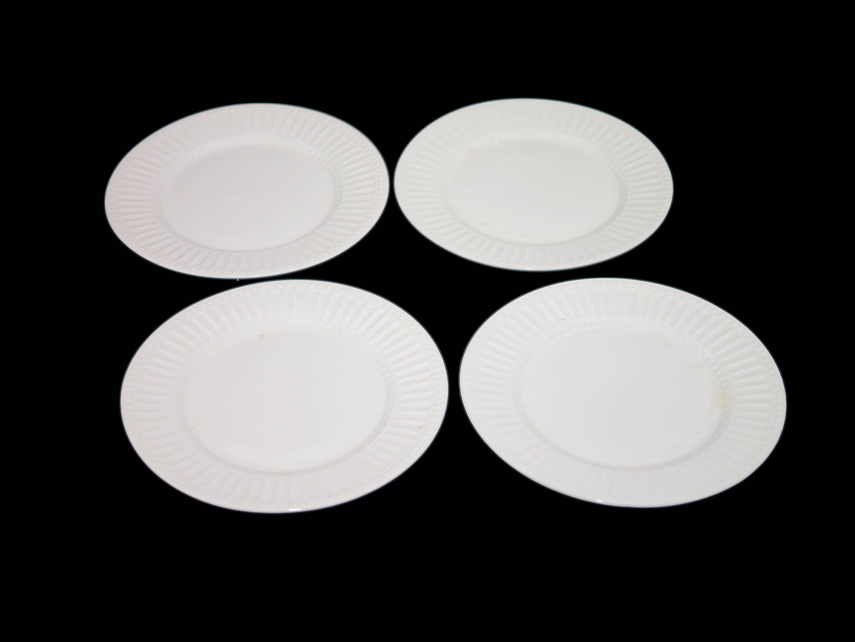 Four Philippe Richard for Tabletops Avenue Brentwood salad plates.