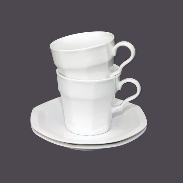 Pair of Christopher Stuart Maison Blanche Y0008 all-white cup and saucer sets.