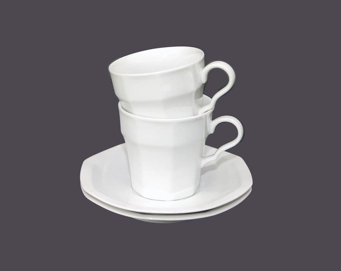 Pair of Christopher Stuart Maison Blanche Y0008 all-white cup and saucer sets.