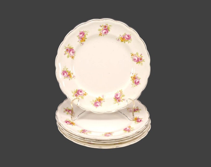 Five Wood & Sons bread, dessert plates. Woods Ivory Ware made in England. Pink roses, yellow flowers.