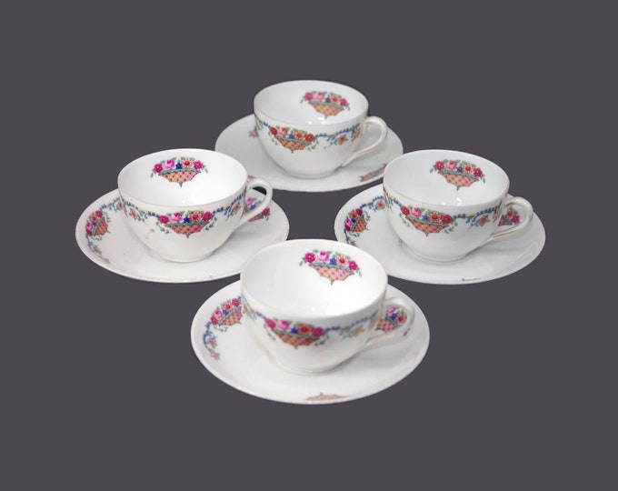 Four Victoria China 264 cup and saucer sets made in Czechoslovakia. Flowers in basket.
