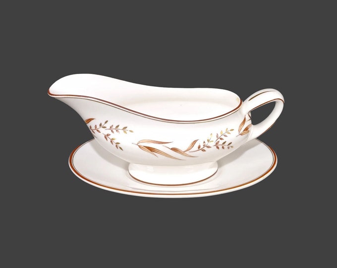 Royal Doulton Autumn Breezes H4932 gravy boat with oval under-plate. Bone china made in England.