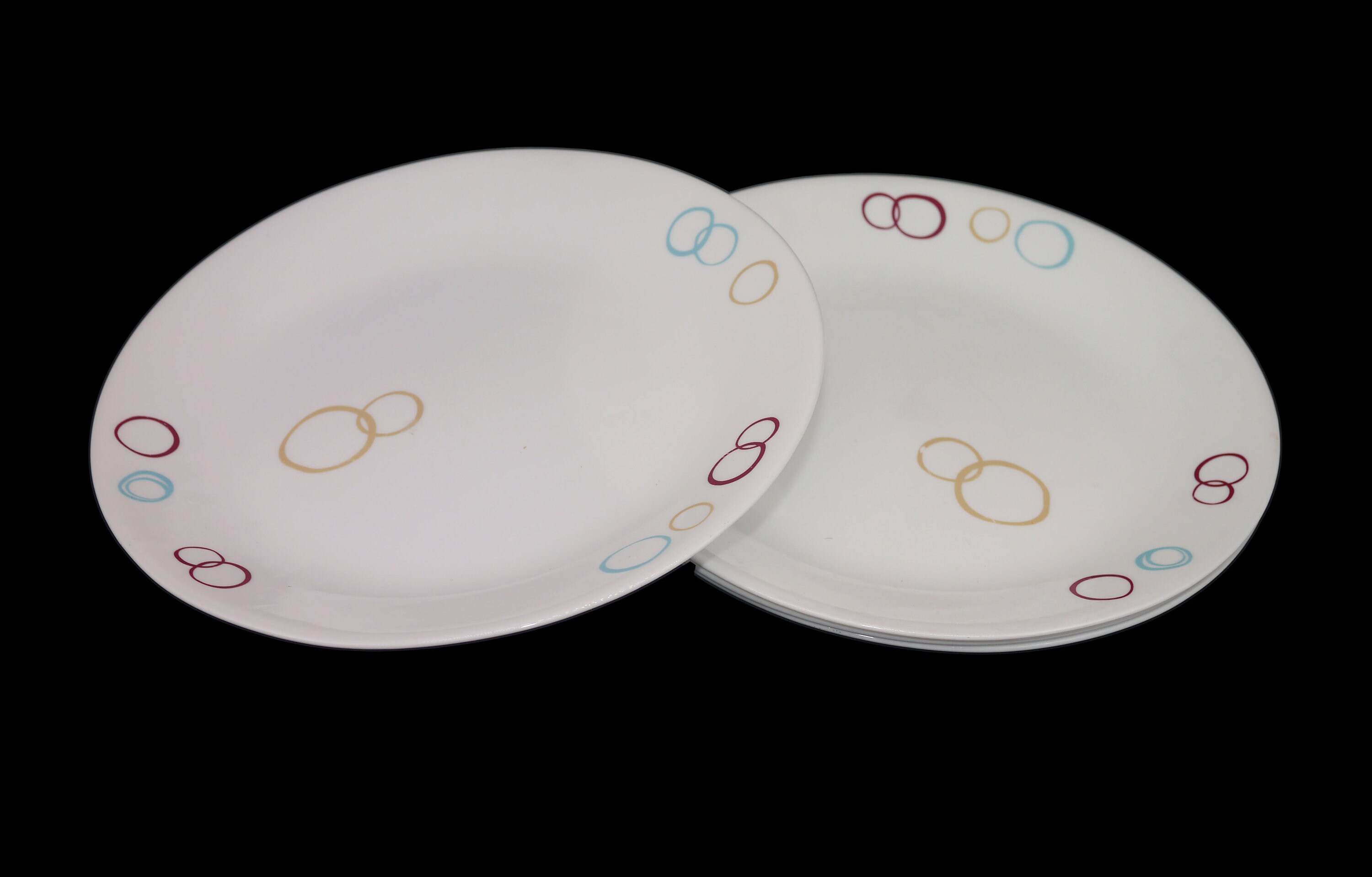 Four Corelle Corningware Circles dinner plates made in USA.