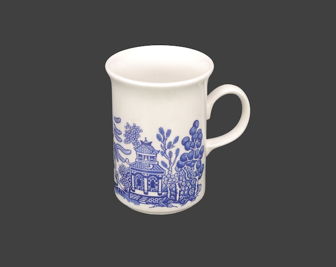 Churchill China Blue Willow blue-and-white tea mug. Classic blue-and-white Chinoiserie made in England. Sold individually.