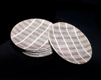 Four Crown Lynn Tres Bon bread plates made in New Zealand. Sold as sets of four only.