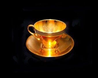 Royal Winton Grimwades Golden Age cup and saucer set. Gold lusterware made in England.