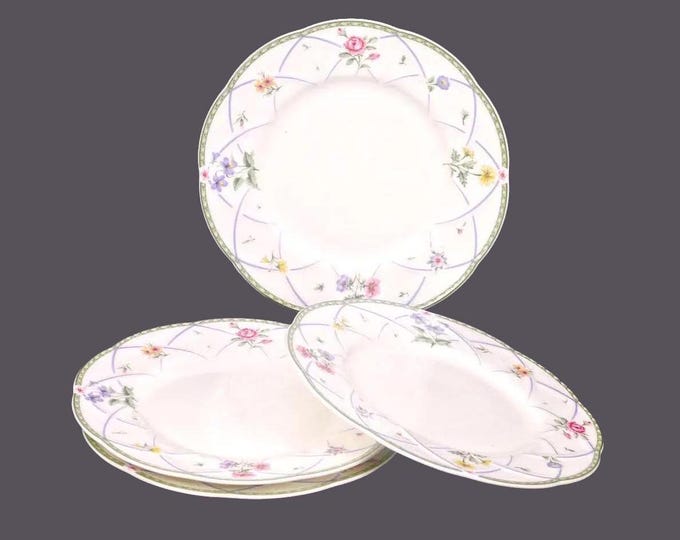 Four Mikasa Spring Prose A8010 bone china bread plates.