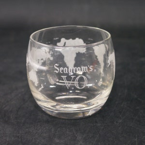 Vintage Seagram's VO roly-poly lo-ball glass with world map.