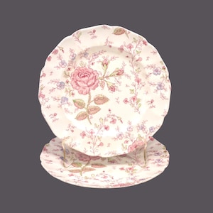 Pair of Johnson Brothers Rose Chintz salad plates made in England. Flaws (see below).