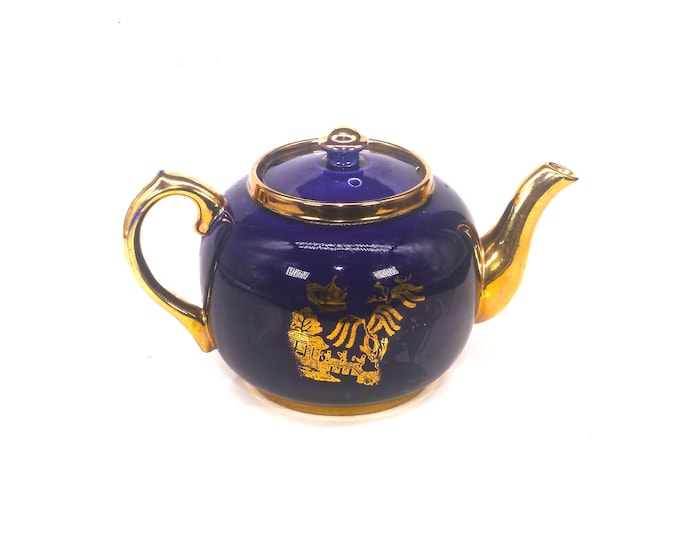 Sudlow's | Gibsons C1900 cobalt and gold Chinoiserie teapot. Pagoda theme. Flaw (see below).