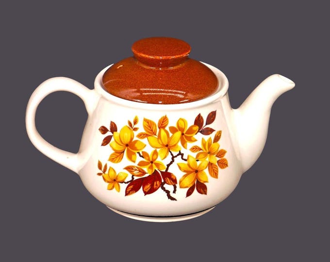 Sadler four-cup teapot. Fall | autumn-colored leaves, brown lid. Made in England.