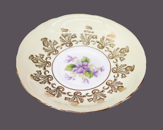 Paragon A4110/2 hand-decorated florals and filigree orphaned saucer only. Bone china made in England.