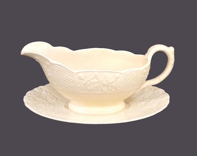 Royal Cauldon Bristol Garden style gravy boat with attached under-plate made in England. Flaw (see below).