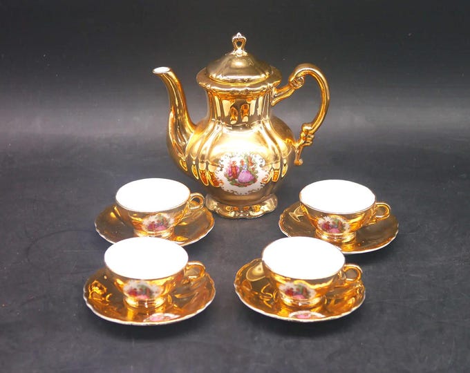 Genex Versailles Fragonard gold lusterware espresso service. Espresso pot, four demitasse sets made in Japan.