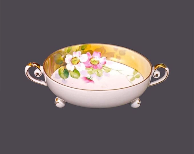 Antique hand-painted Nippon double-handled, tri-footed cream soup cup | bowl (no saucer). Pink, white flowers. Van Patten 84 mark.
