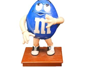 Vintage M&M's Mars Mr. Blue gumball candy dispenser.