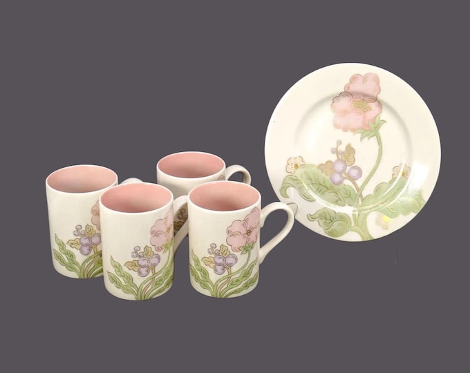 Five pieces of Fitz & Floyd Cotillion Garden tableware made in Japan. Four coffee or tea mugs, one salad plate.