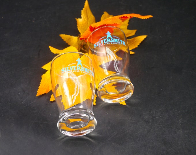 Pair of Silversmith Brewing beer sampling | beer tasting glasses. Etched-glass branding.