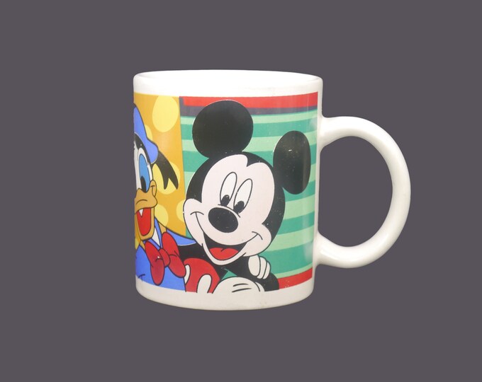 Mickey Mouse, Pluto and Donald Duck ceramic coffee or tea mug.