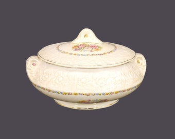 Sovereign Potters 322-37 covered serving bowl. Floral creamware. English ironstone decorated in Canada.