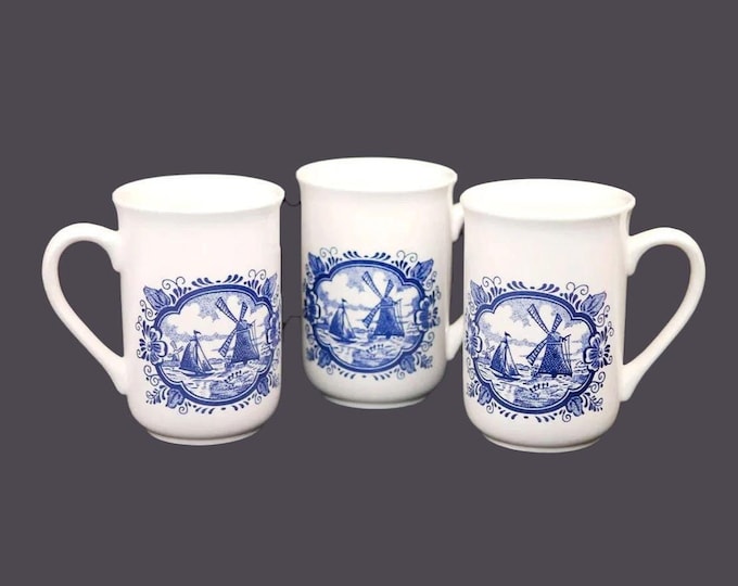 Three Churchill China Delft Windmill blue-and-white ceramic tea mugs made in England.