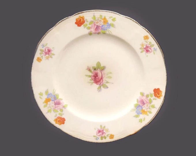 Alfred Meakin Dronfield salad plate made in England. Sold individually.