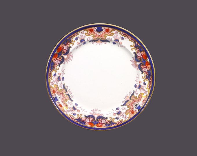 Antique late Victorian era Booths Lucania hand-decorated dinner plate. Royal Semi Porcelain made in England. Sold individually.