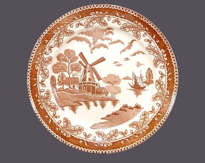 Japan JAP82BR brown transferware Holland Scenes dinner plate. Windmill, birds, acorn border. Sold individually.