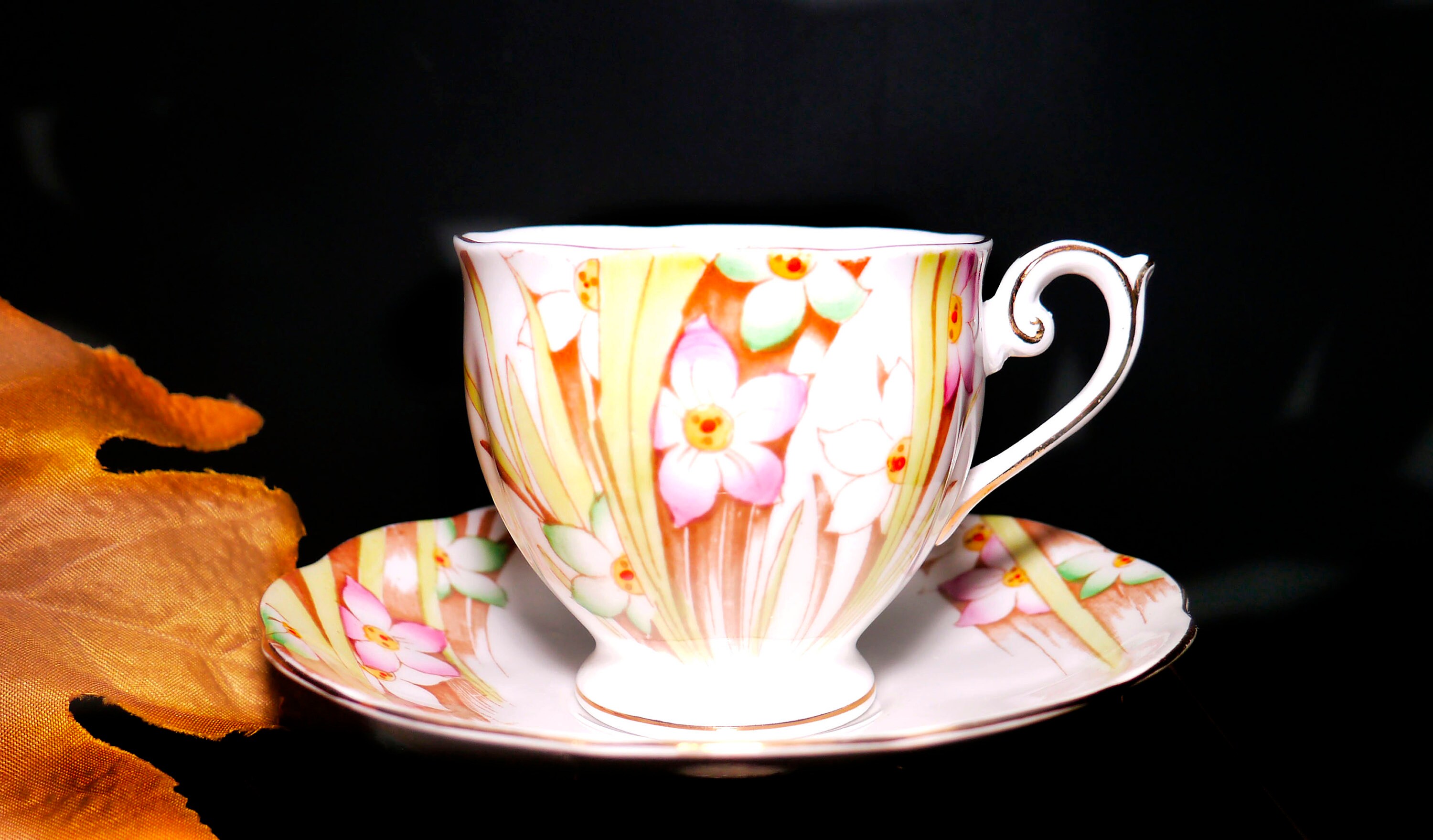 Bell China 3664 handdecorated cup and saucer set made in England.