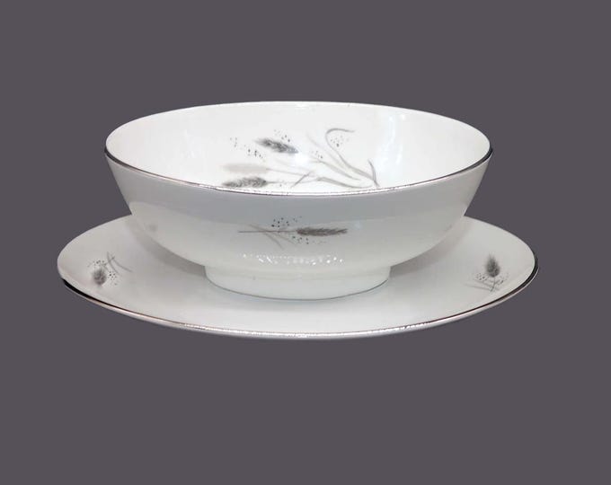 Easterling Kora gravy boat with attached under-plate made in Germany.