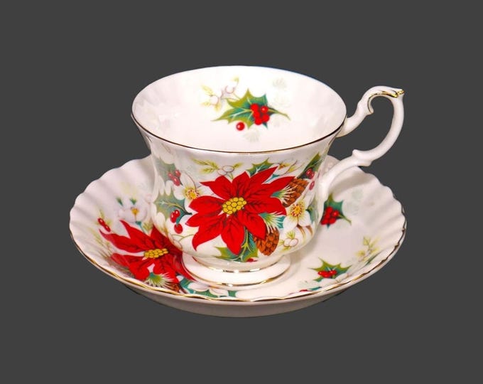 Royal Albert Poinsettia Christmas cup and saucer set. Bone china made in England.