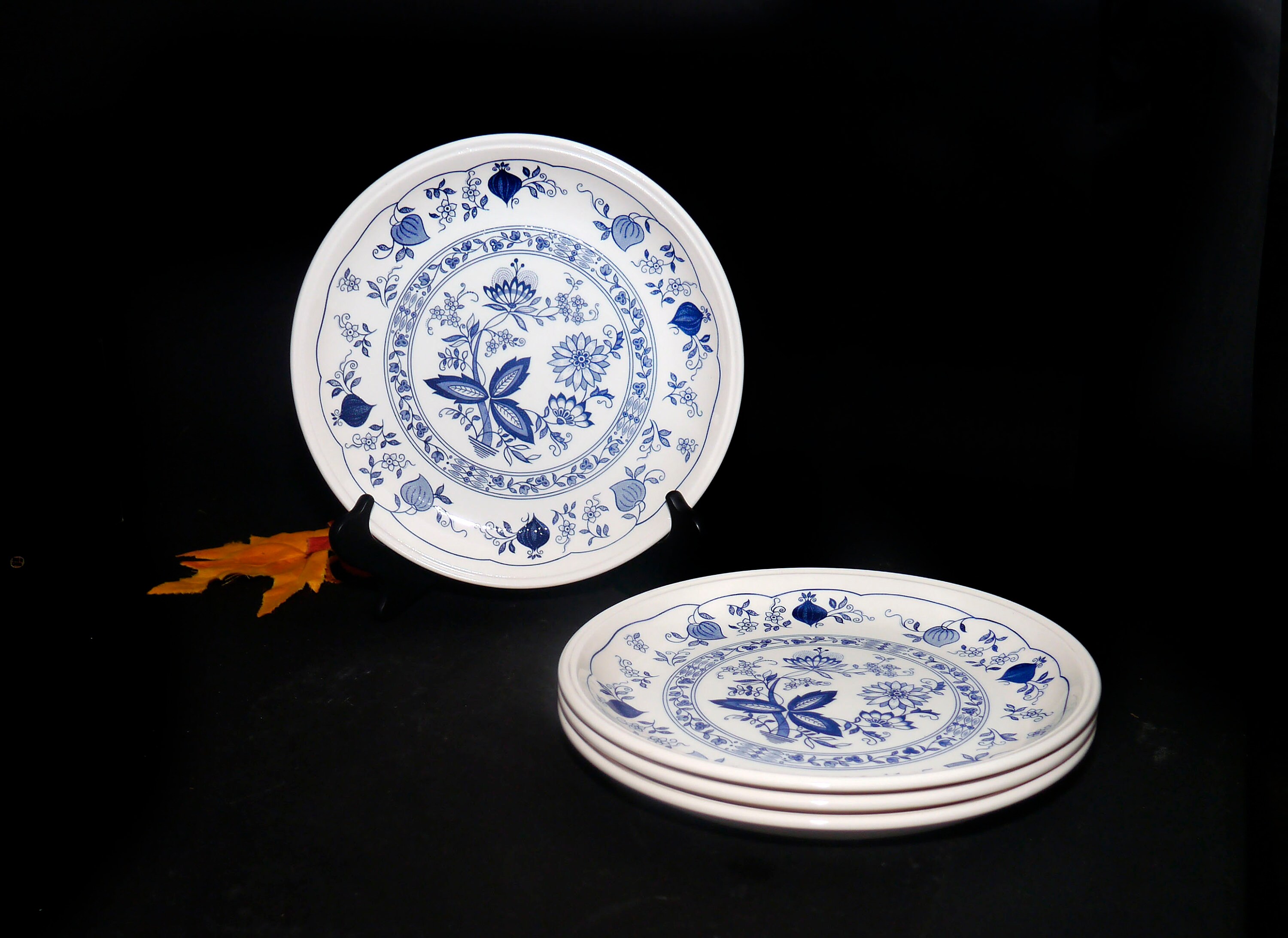 Four Biltons Blue Onion dinner plates made in England.