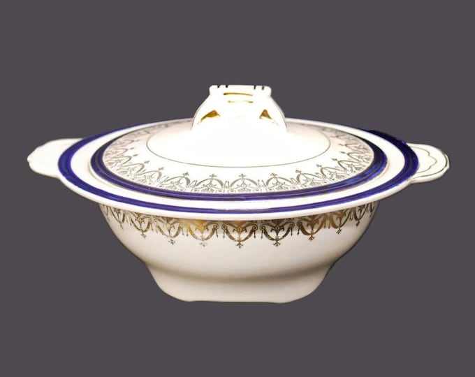 HK Tunstall | Hollinshead Kirkham 4228 small covered lugged serving bowl made in England. Flaws (see below).