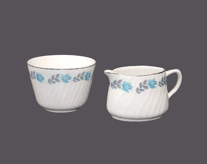 Barratts creamer and open sugar bowl set made in England. Blue roses.