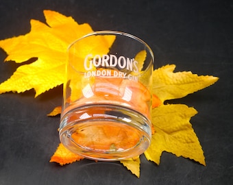 Gordon's London Dry Gin lo-ball, scotch whisky, old-fashioned glass. Etched-glass branding.