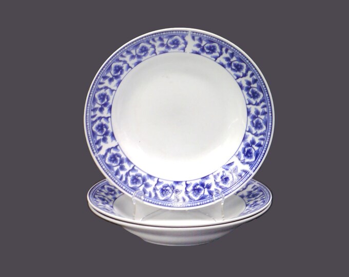 Three Royal Heritage Country Cottage blue-and-white floral toile rimmed soup bowls.