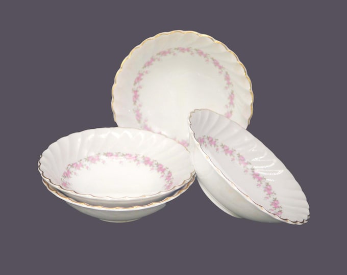 Four Myott Pink Petite coupe cereal or soup bowls made in England. Crazing and marks (see below).