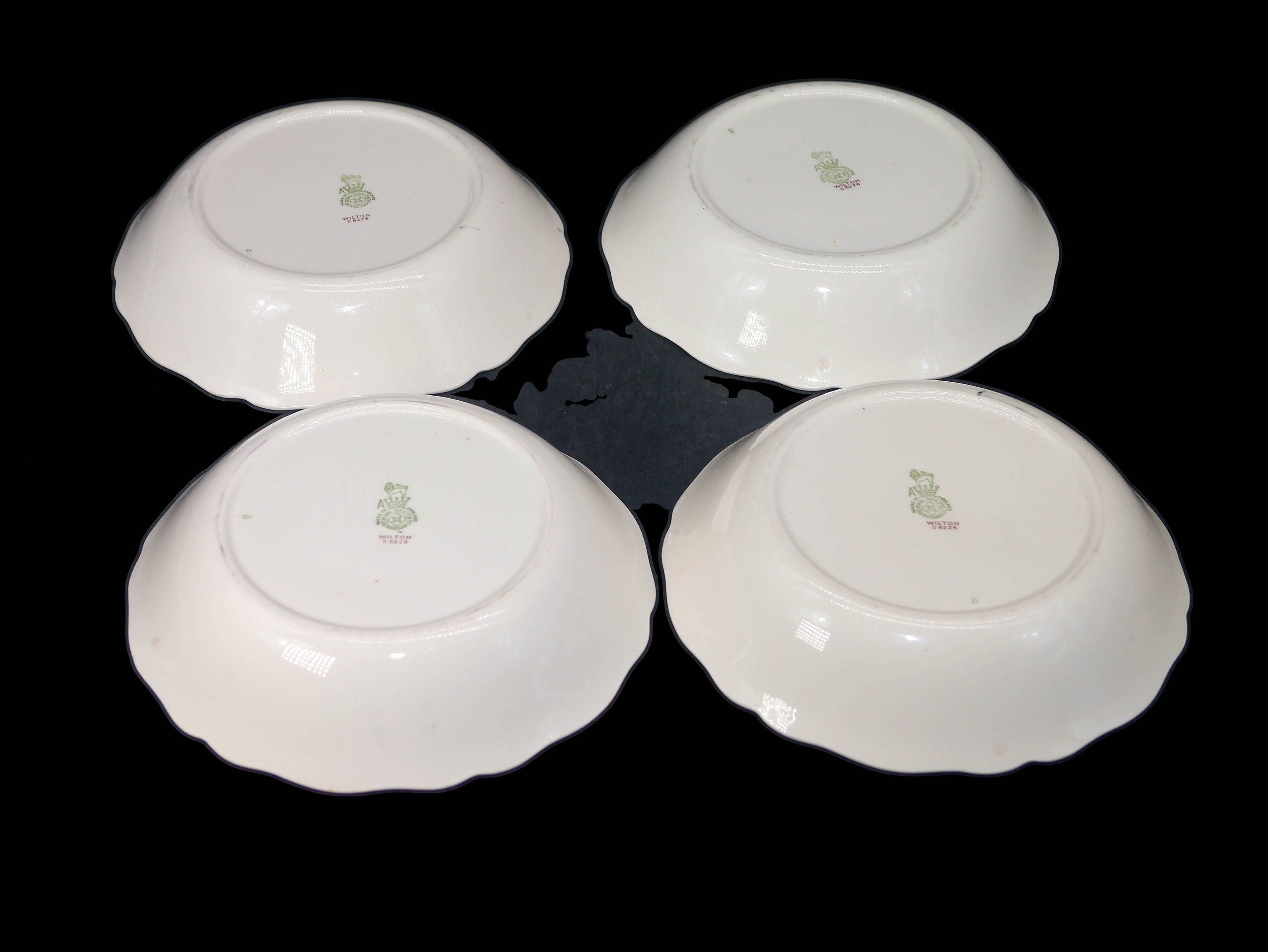 Four Royal Doulton D6226 Wilton bone china soup bowls made in England.