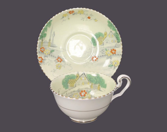 Antique Cartwright & Edwards Victoria CAE15 cup and saucer set made in England. Green with English cottage scene.