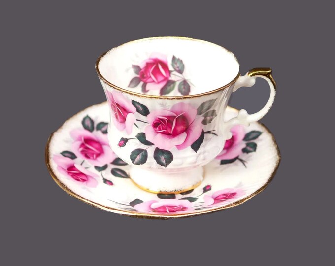 Elizabethan Bone China 4283 cup and saucer set made in England. Flaw (see below).