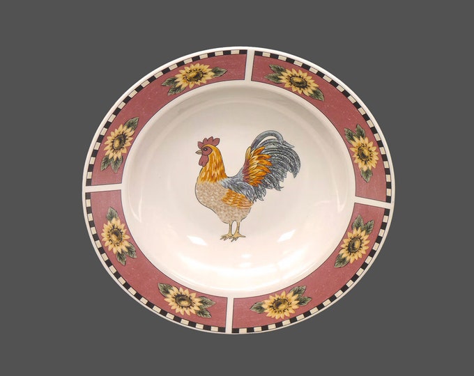 Gibson Brewster rimmed soup bowl. Central rooster, sunflower rim. Sold individually.