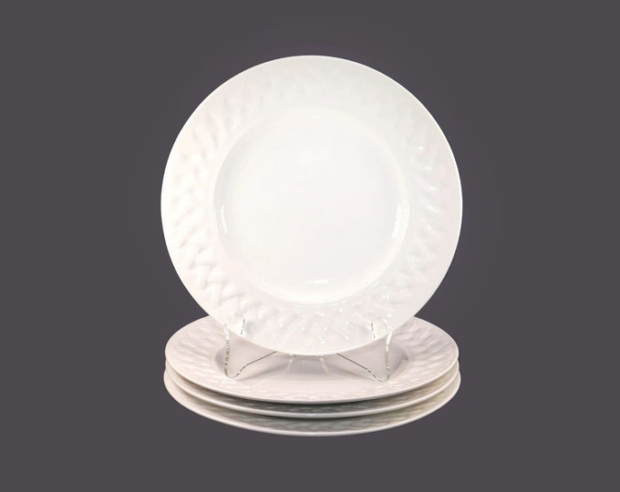 Four Martha Stewart French Cupboard White salad plates. Chef's favorite all-white tableware.