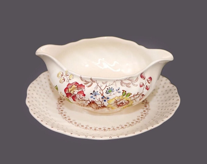 Art-deco era Royal Doulton Grantham D5477 gravy boat with attached under-plate and twin spouts made in England.